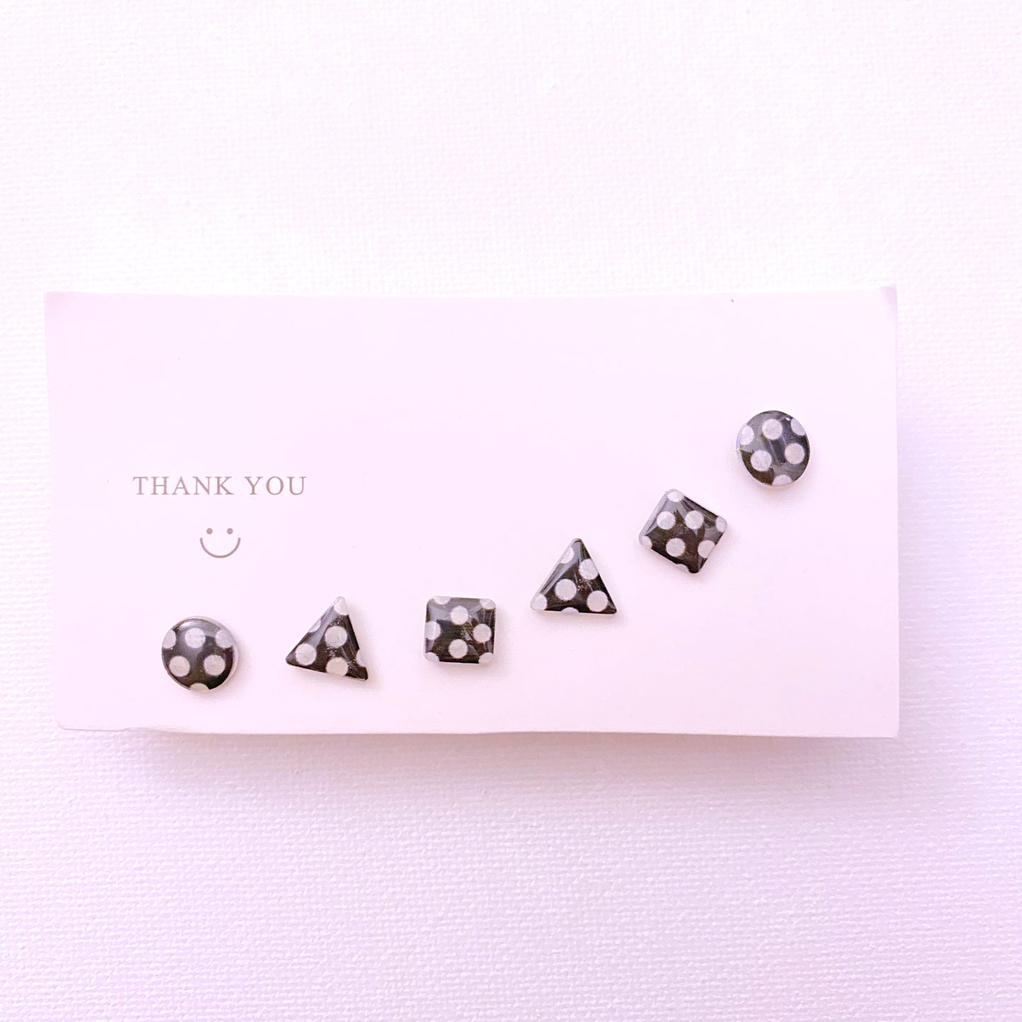 Black and white stud earring